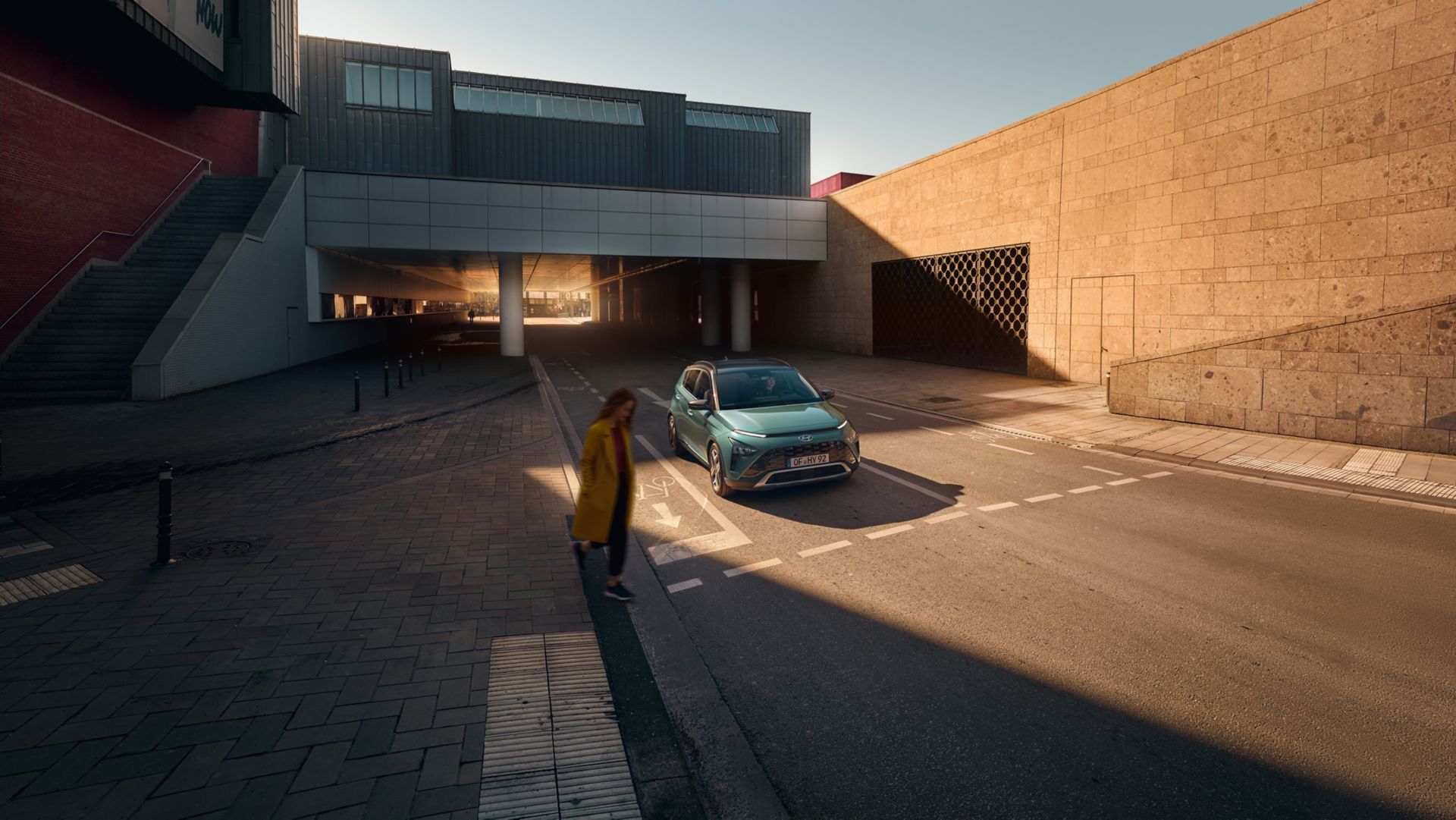 The all-new Hyundai BAYON compact crossover SUV on a crosswalk.