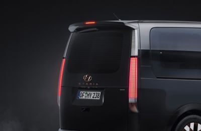A picture of the elegant rear LED combination lamps of the all-new STARIA Premium.	