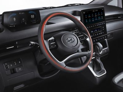 The heated steering wheel inside of the all-new Hyundai STARIA multi-purpose vehicle.